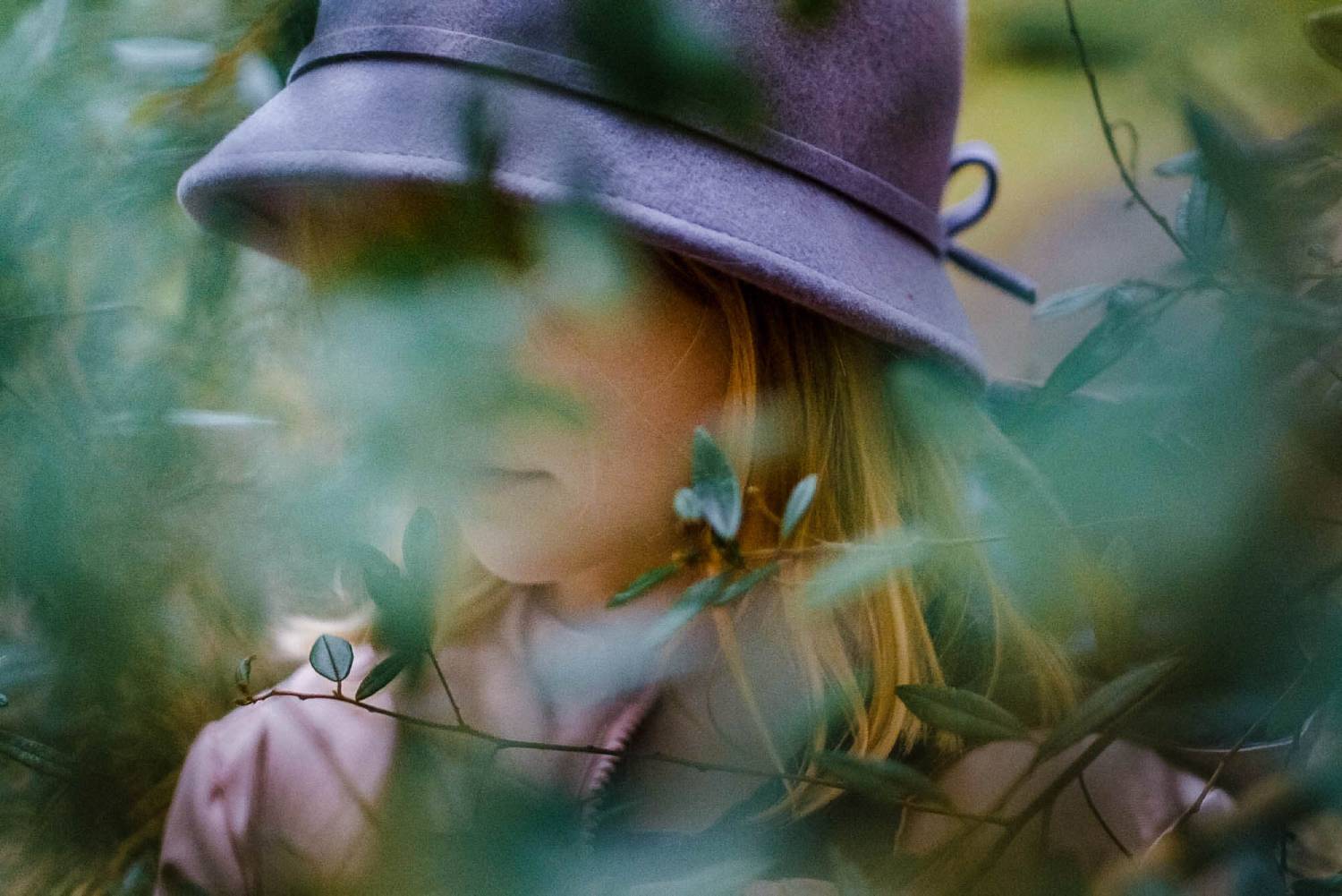 portrait of a girl surrounded by plants