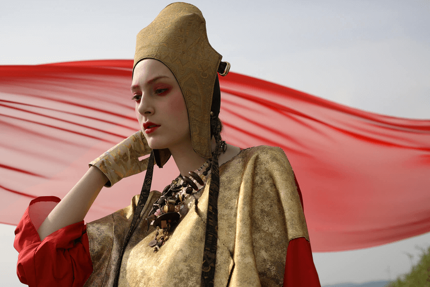 Female fashion model in unusual gold hat, dress and gloves, photographed with the Canon EF 24-105mm f/4L IS II USM lens