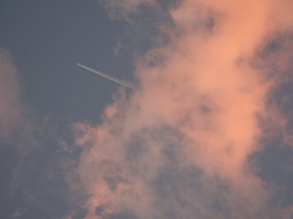 Airplane in the sky during sunset, taken using the Fujifilm GFX50S Mk II camera