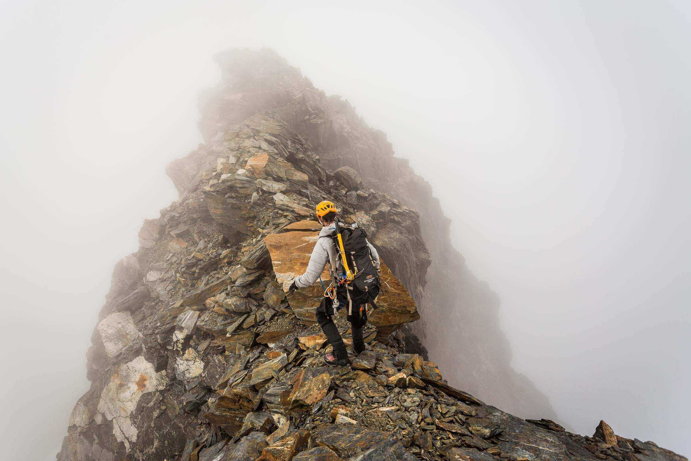 Scott Amjah traverses towards the summit of Mount Brewster in the New Zealand Alps