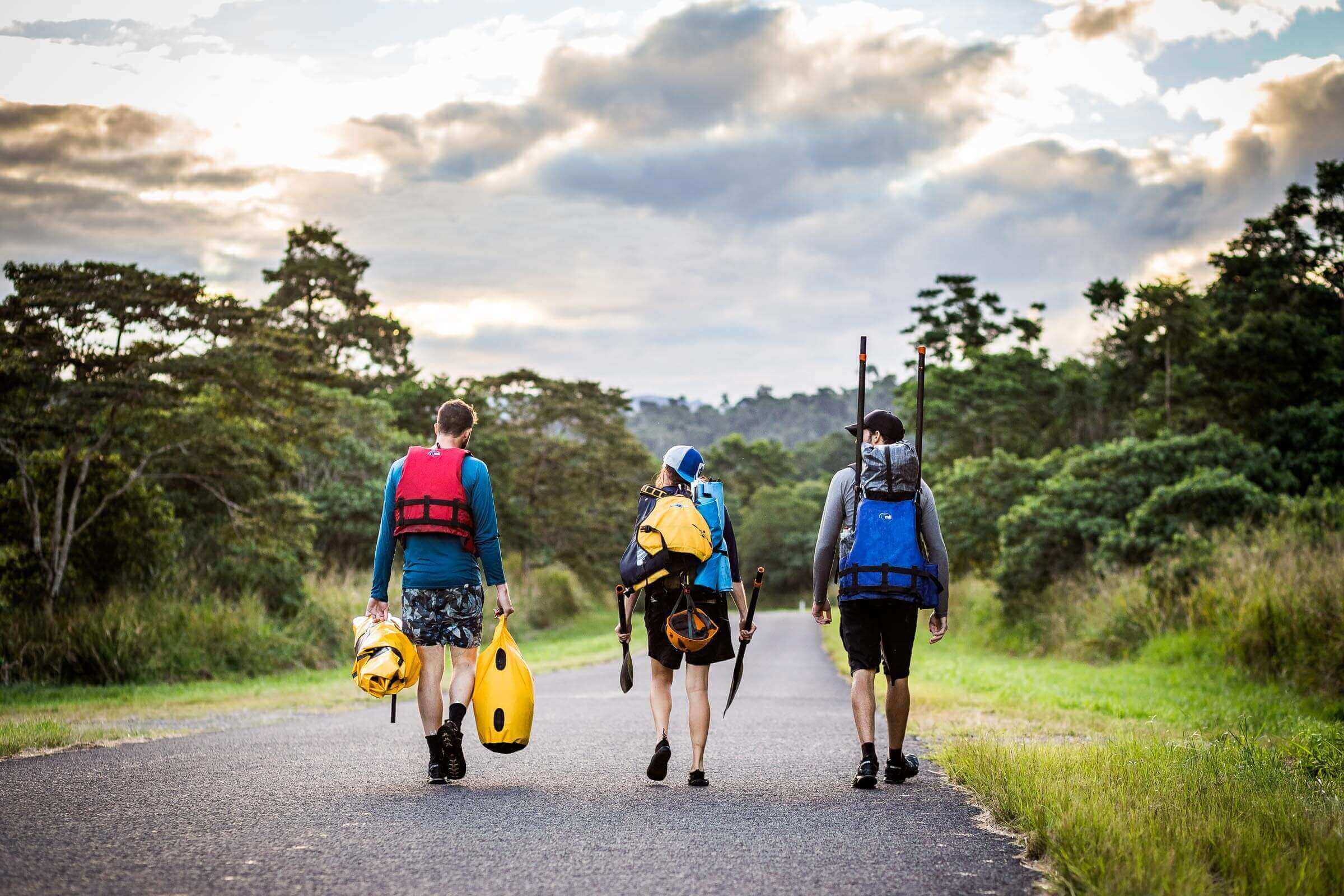 Walking back to camp after a day of whitewater packrafting on the Tully River in north Qld