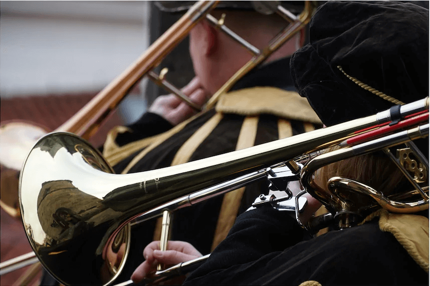 Historically costumed trombone players performing, photographed with the Sony E PZ 18-105mm f/4 G OSS lens