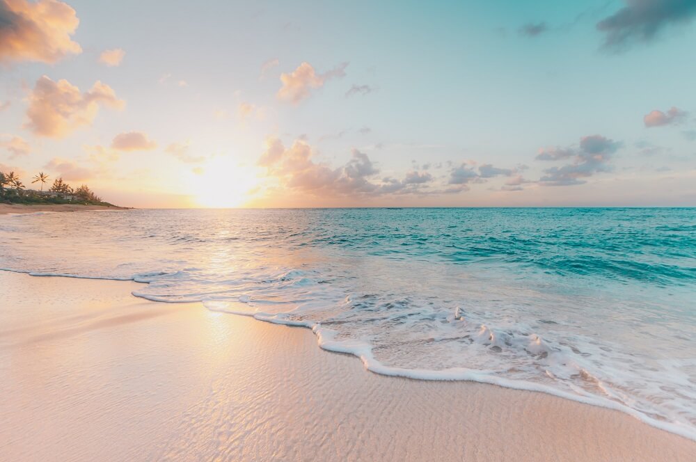 Turquoise blue beach with powdery white sand