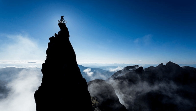 Biker on top of a pinnacle rock, taken using a LEE100 Polariser Filter