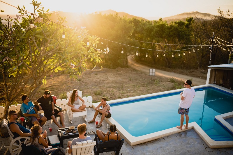 pool party with friends during sunset