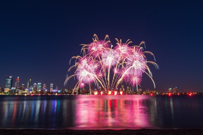 fireworks photography in the city skyline