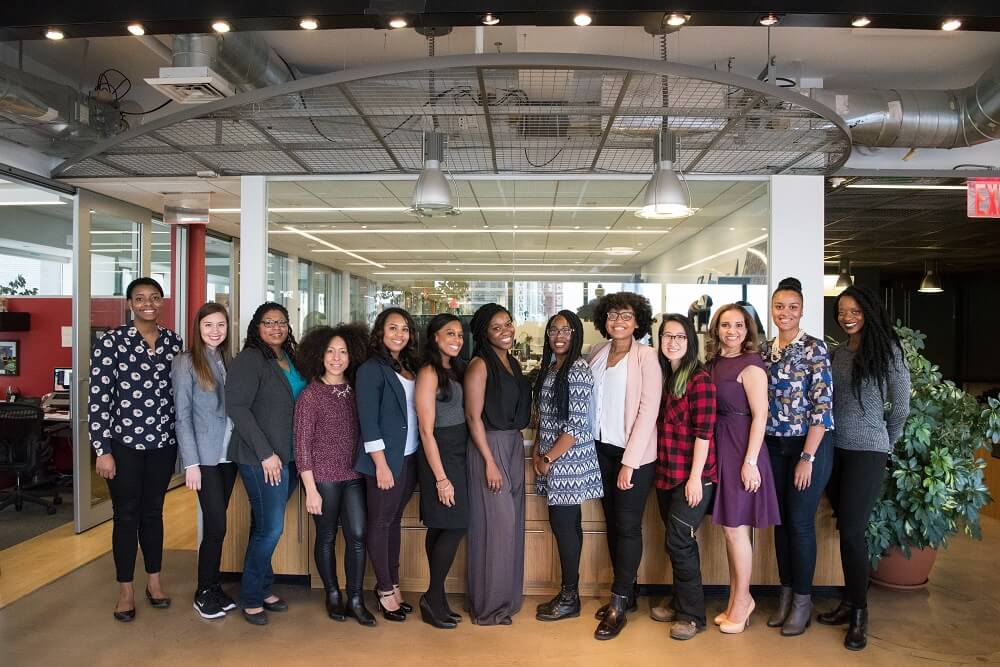 A group of successful woman posing for a formal event picture