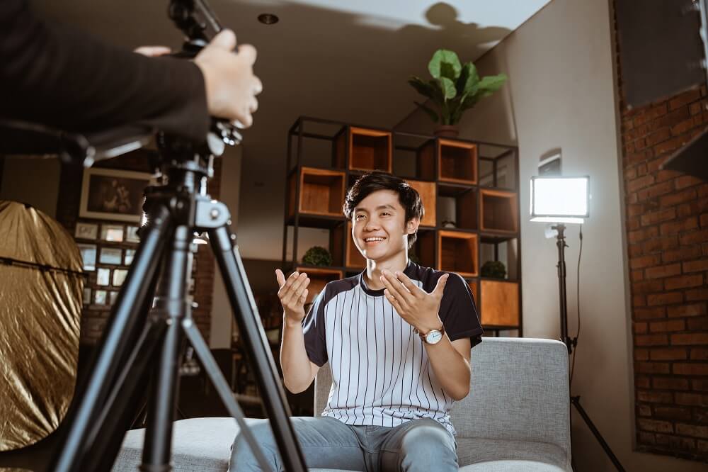 A guy talking in front of a camera