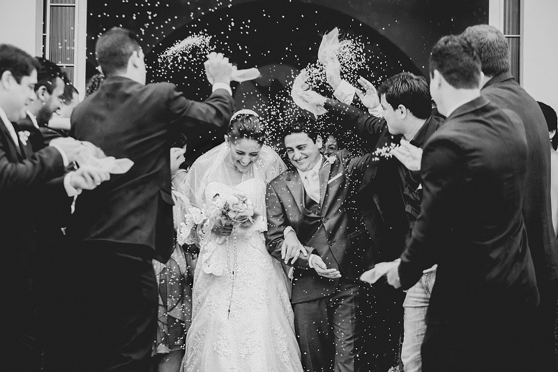 black and white photo of newly wed couple using back button focus