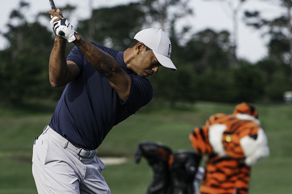 Tiger Woods playing golf, taken by Kurt Thomson.