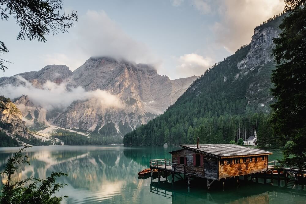 Scenic view of a cabin by the lake