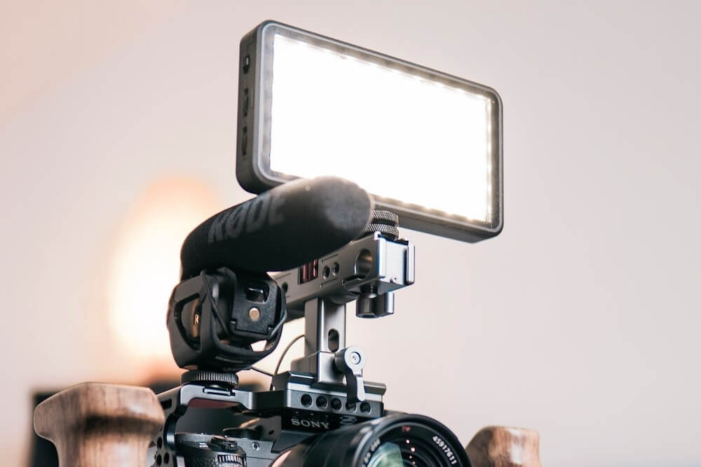 An on-camera LED light attached on a vlogging camera