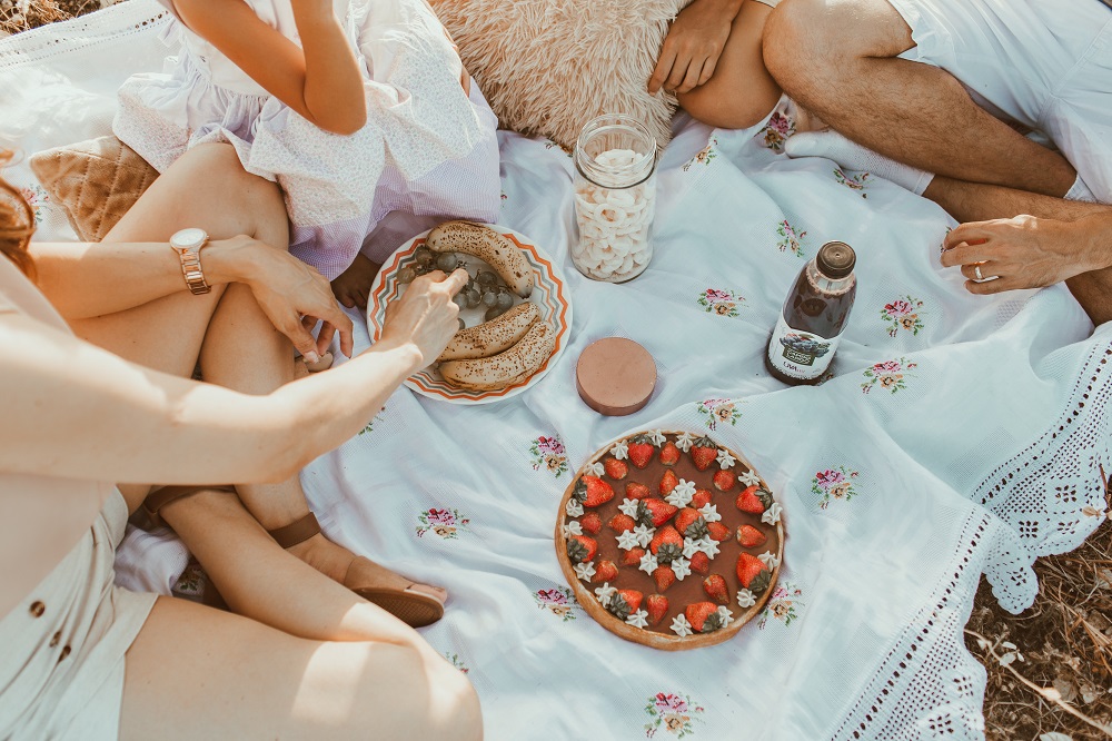 Lifestyle photo of a family having a picnic