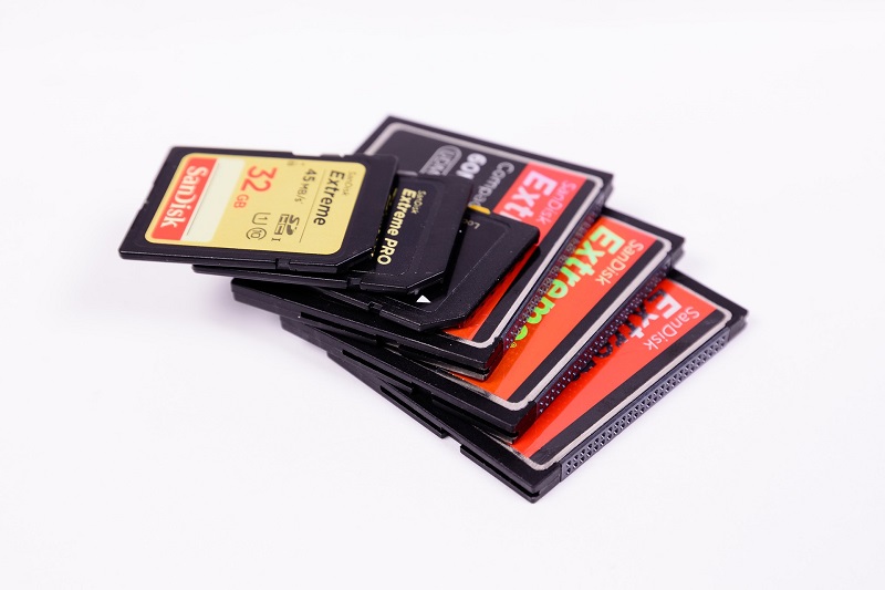 a pile of different memory cards