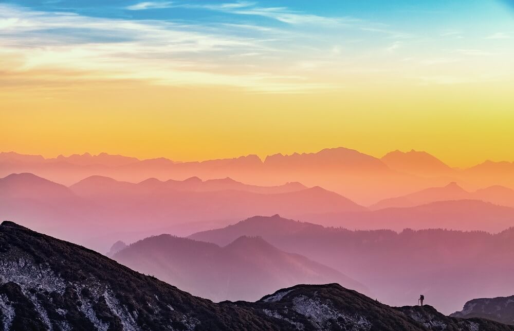 A colourful view of a mountain range