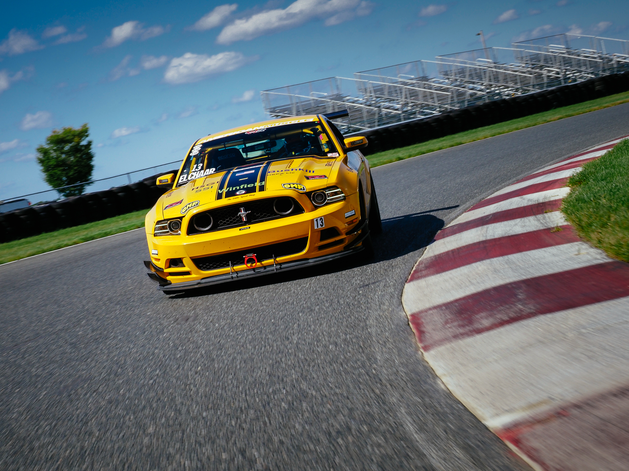 yellow car in a race