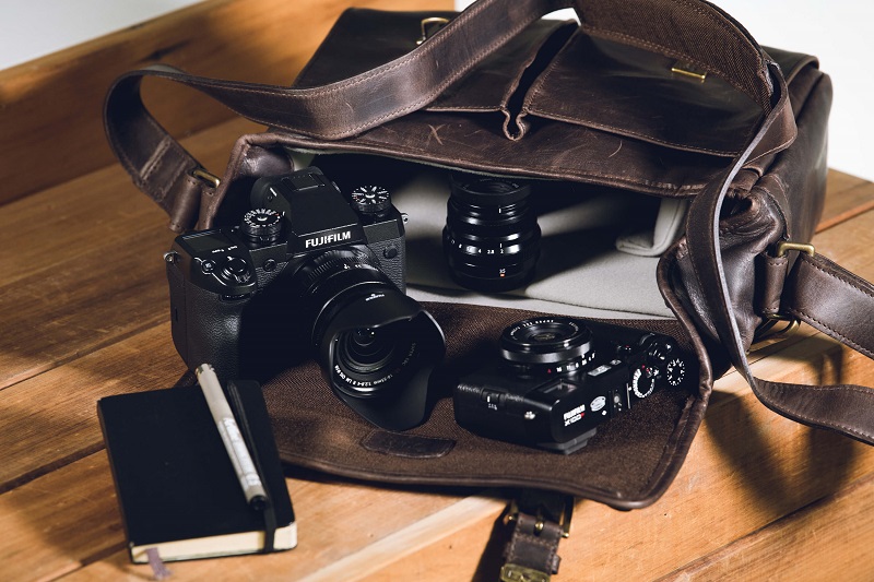 ona leather camera bag with fuji camera