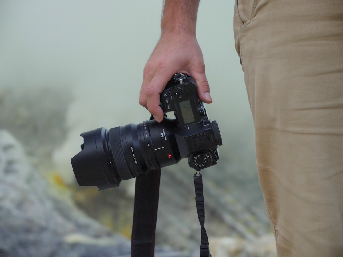 man holding the new lumix camera