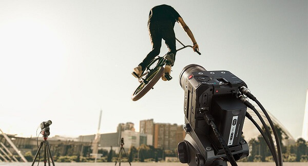 Panasonic BGH1 cameras pointing at a BMX bike rider suspended mid-air