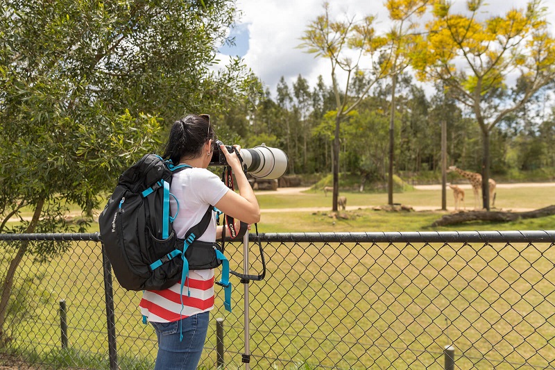 photographer with fstop backpack