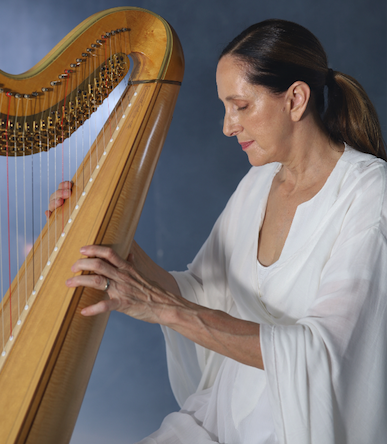 woman playing the harp