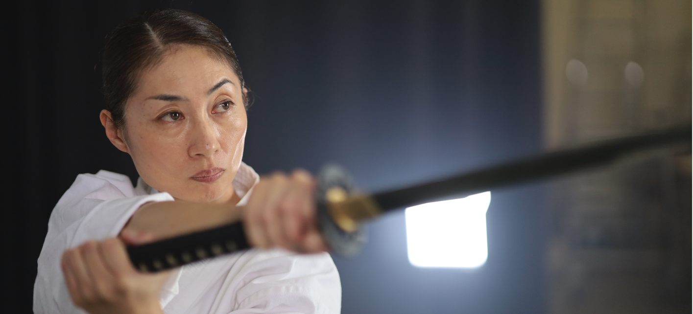 woman holding a sword