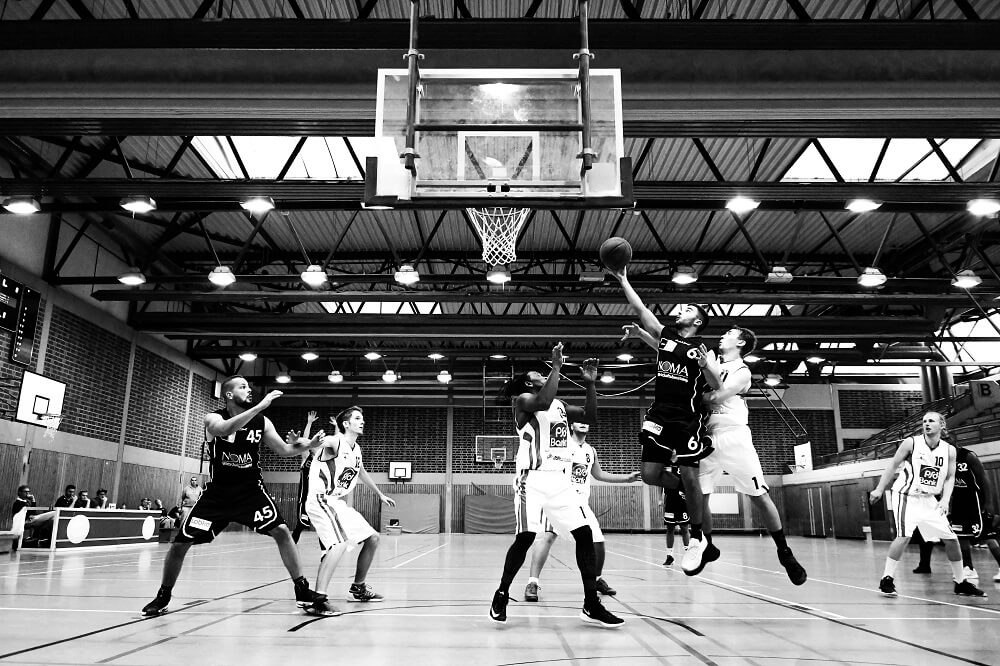 sports photography shot of basketball players in action