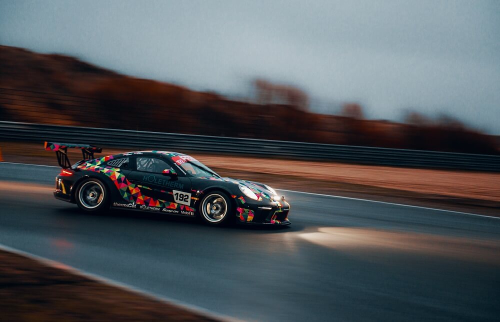 a sports photography shot of a race car