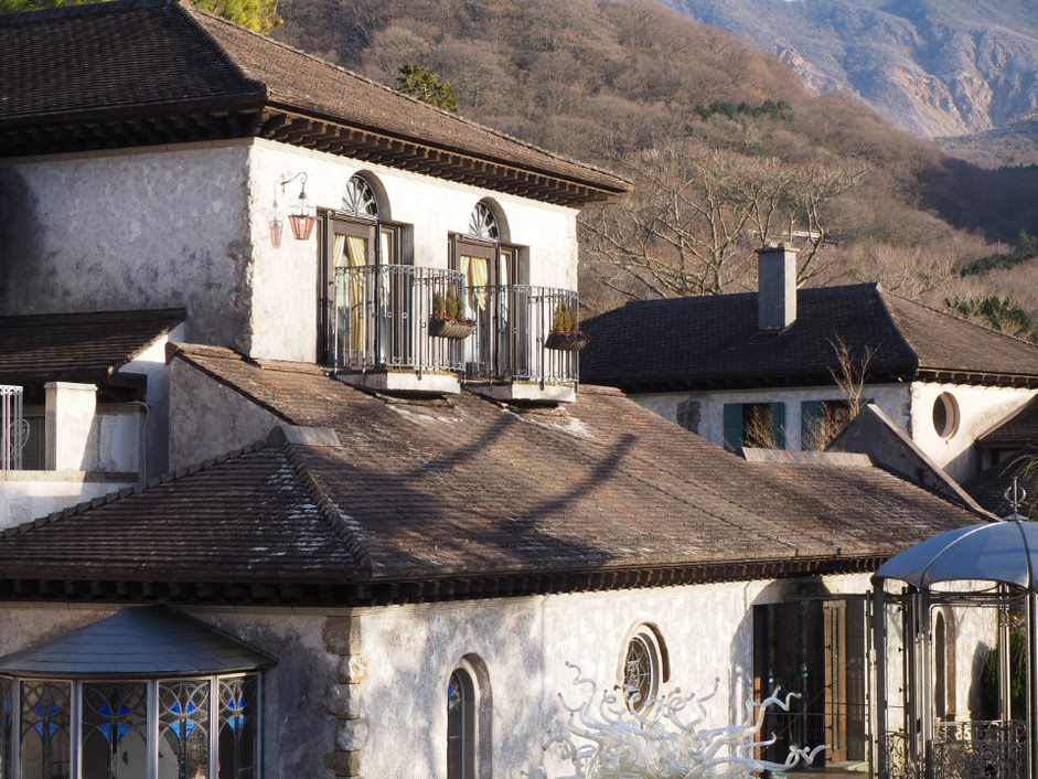 Charming, brown-roofed, whitewashed houses in the countryside, photographed with the Olympus EM10 Mark IV camera