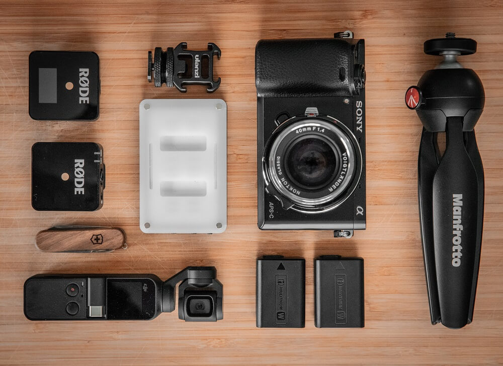 Flat lay photo of some videography gears